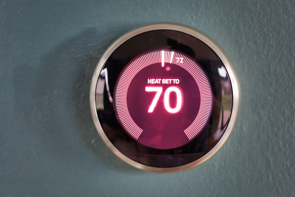 image of a wi-fi thermostat for a home heating system that uses fuel oil