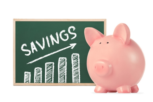 savings written on board and piggy bank depicting cooling costs savings