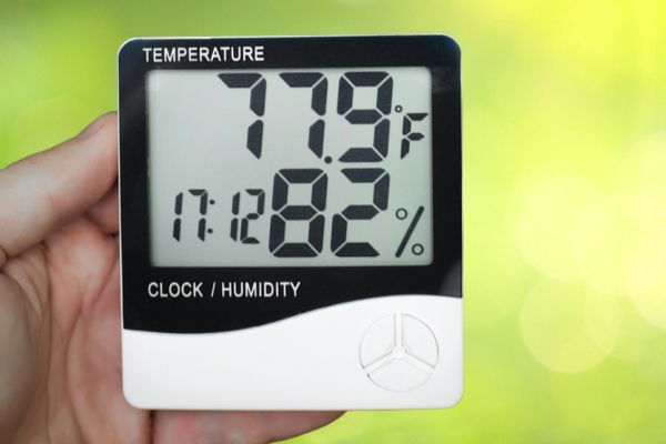 hygrometer showing high indoor humidity rate depicting reduced humidity management