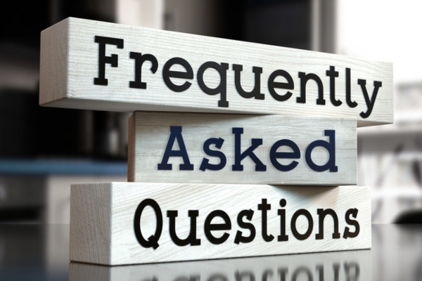 Frequently Asked Questions written on wooden bars depicting FAQs about heating system efficiency