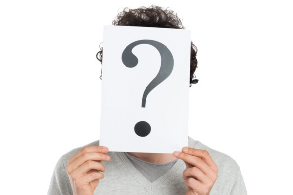 question mark covering a man's head depicting FAQs about heating oil filter replacement