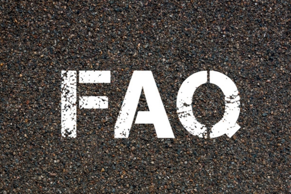 FAQ spray painted on concrete depicting questions about oil heating costs