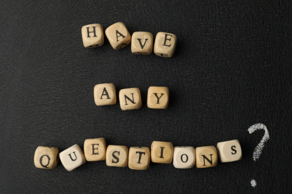 "have any questions" spelled using wooden letter cubes depicting FAQs about heating oil prices