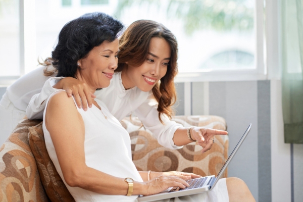 mother and daughter researching to find the best replacement boiler