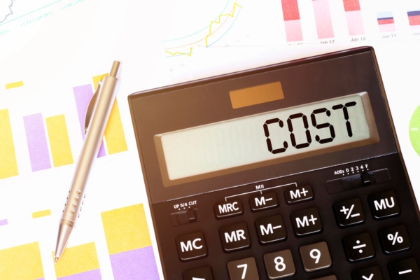 Word COST on calculator depicting fuel oil tank replacement