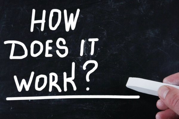 how does it work written on chalkboard depicting oil furnace reset button