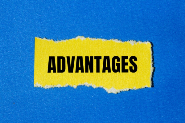 Advantages written on ripped yellow torn paper depicting ductless air conditioner
