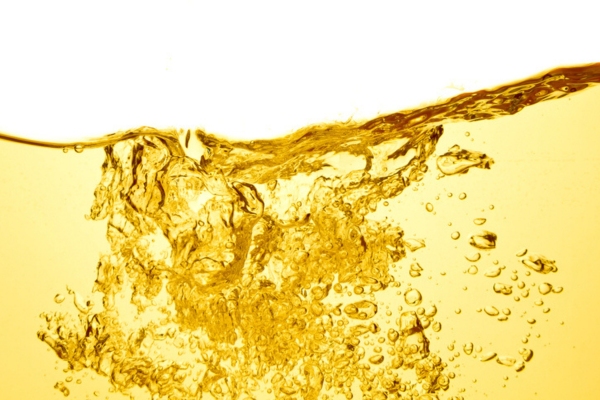 image of gold liquid depicting heating oil