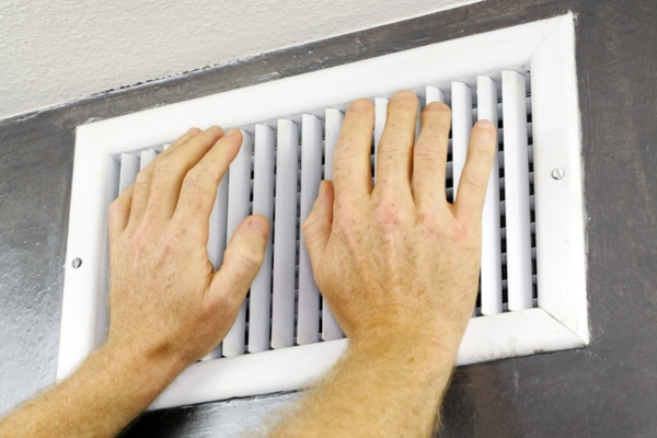 Hands on an Air Vent