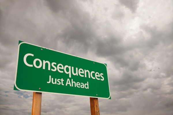 Consequences Just Ahead Green Road Sign Over Storm Clouds