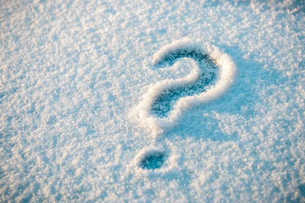 question mark drawn on snow depicting Furnaces and Boilers FAQs