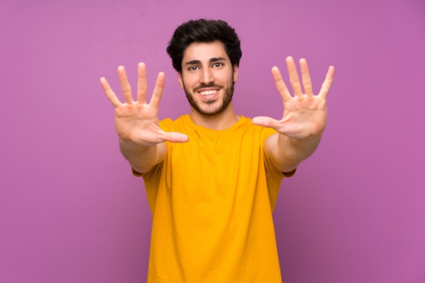 man holding 10 fingers up depicting Common Causes Of An AC Unit Not Blowing Cold Air