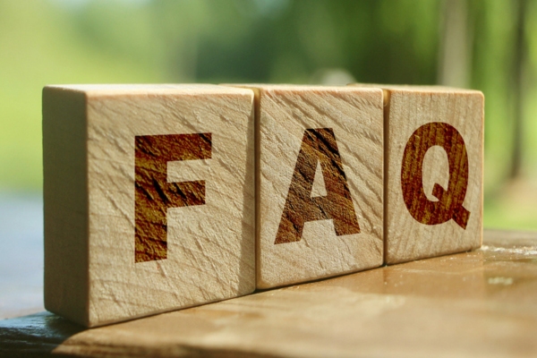 FAQ spelled using wooden letter chips depicting Heating Oil Tank Corrosion FAQs