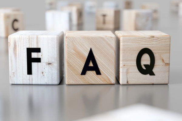 FAQ spelled using wooden letter cubes depicting Lights Flickering When AC Turns On questions
