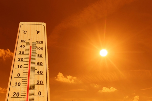 thermometer and sun depicting summer heat