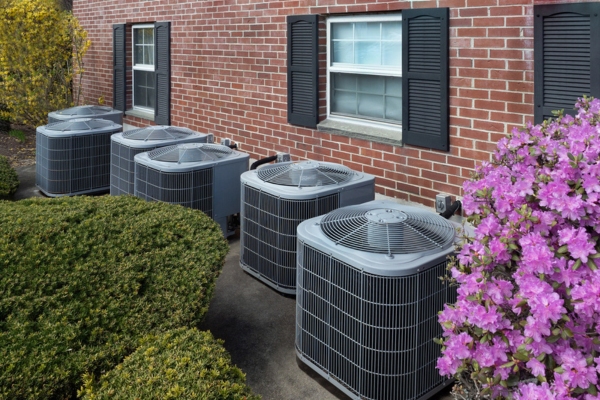 air conditioner condensers outside the house