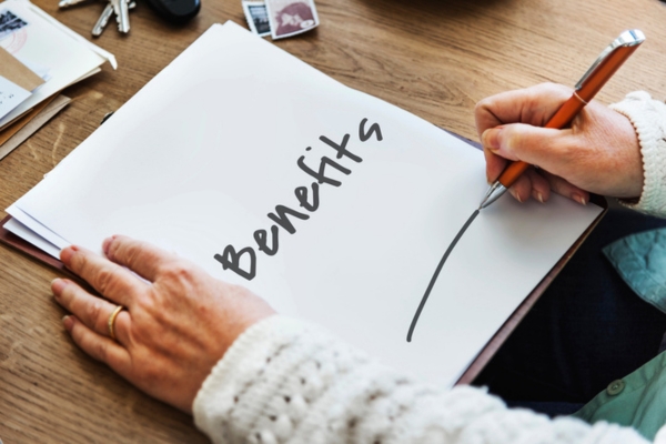 BENEFITS written on paper depicting Choosing a Local Heating Oil Supplier